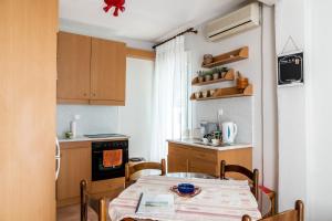 Kuchyň nebo kuchyňský kout v ubytování Next To The Sea - Apartment