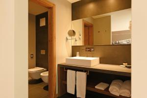 Kúpeľňa v ubytovaní Dolomeet Boutique Hotel