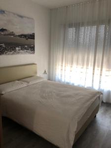 Letto o letti in una camera di Hotel Ceresio