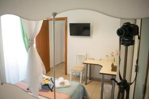 イラクリトサにあるStella's Rooms - Nea Iraklitsaの三脚カメラ