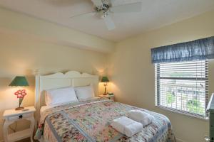 a bedroom with a bed with two towels on it at 320 COV - Relaxing Oceanfront Villa - Unbeatable Views in Folly Beach +20 photos
