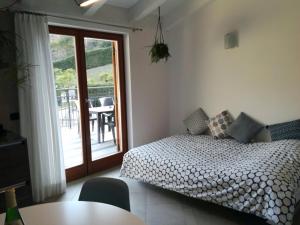 Posteľ alebo postele v izbe v ubytovaní Appartamento Il Soffio