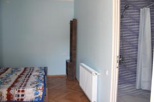 Letto o letti in una camera di Guesthouse Kiko