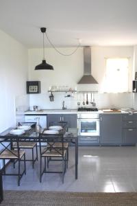 Η κουζίνα ή μικρή κουζίνα στο Genius Apartments