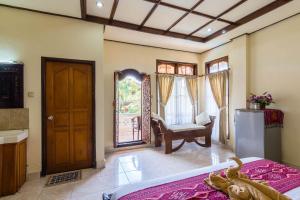 Un pat sau paturi într-o cameră la Sagitarius Inn