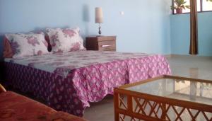 Postel nebo postele na pokoji v ubytování ponta gato residence