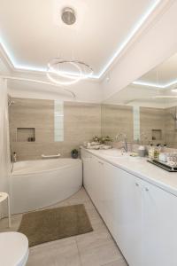 Koupelna v ubytování Apartament Prestige & Sea Playa Baltis 63