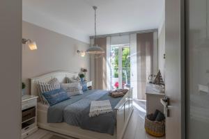 Posteľ alebo postele v izbe v ubytovaní Apartament Prestige & Sea Playa Baltis 44