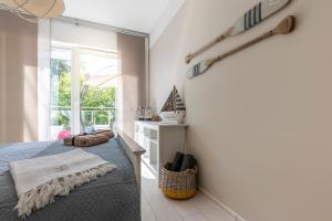 Posteľ alebo postele v izbe v ubytovaní Apartament Prestige & Sea Playa Baltis 44