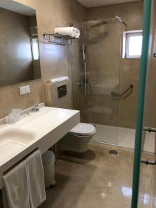Koupelna v ubytování Hotel Paiva