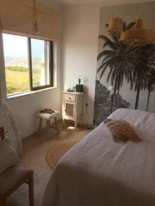 Postel nebo postele na pokoji v ubytování Villa Machado