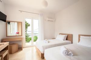 Cama ou camas em um quarto em Studios Angeliki