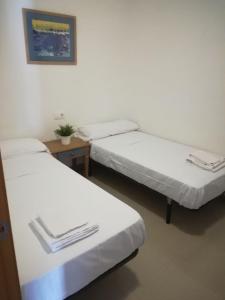 Łóżko lub łóżka w pokoju w obiekcie Be Free Isla Plana