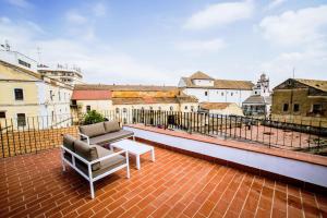 Balkón nebo terasa v ubytování Patios del Orfebre