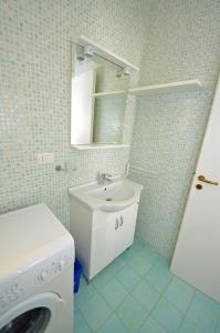 Kylpyhuone majoituspaikassa Casa Baia smeraldo