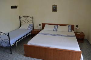 Ліжко або ліжка в номері Casa Baia smeraldo
