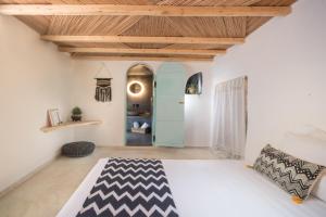 Postel nebo postele na pokoji v ubytování Sophia Boutique Hotel