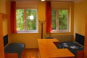 Posezení v ubytování József Attila Guesthouse + 12 fotografií