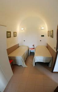 A bed or beds in a room at Casaleaurelia