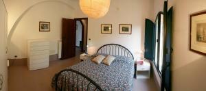 A bed or beds in a room at Casaleaurelia