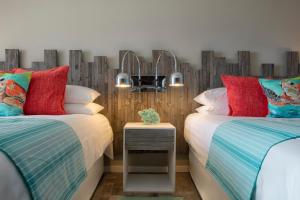 Cama ou camas em um quarto em Sea Breeze Beach House All Inclusive by Ocean Hotels