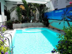 a swimming pool in the middle of a building at Ferienwohnung Eva-Maria in Mahlberg