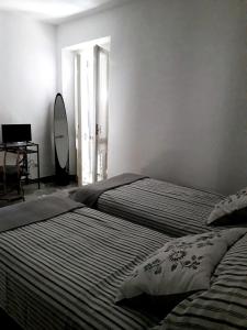 A bed or beds in a room at B&B Castellani
