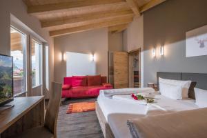 A bed or beds in a room at Apart Dengg