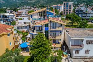 an aerial view of a city with buildings at Villa Jadranka Sutomore in Sutomore