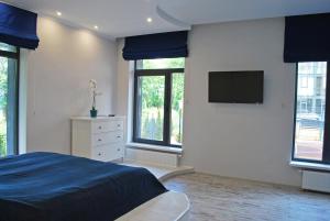 Postel nebo postele na pokoji v ubytování Apartments Malina Sea