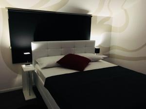 Posteľ alebo postele v izbe v ubytovaní Wil Vannese