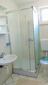 Kúpeľňa v ubytovaní Apartments Rukavina