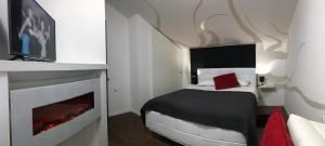 Ένα ή περισσότερα κρεβάτια σε δωμάτιο στο Wil Vannese