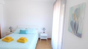Postel nebo postele na pokoji v ubytování D WAN 4 | Baleal