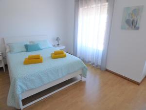 Postel nebo postele na pokoji v ubytování D WAN 4 | Baleal