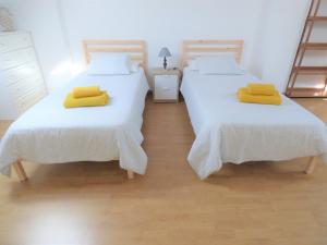 Postel nebo postele na pokoji v ubytování D WAN 4 | Baleal