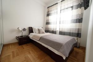 Postel nebo postele na pokoji v ubytování Central Park Lux