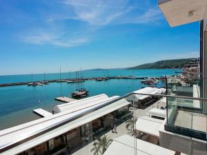 a view of a marina with boats in the water at Antik Apartments in Balchik
