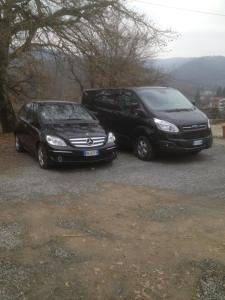 two cars are parked next to each other at B&B Cascina Santa Gavi in Gavi