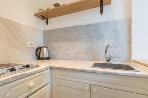 Kuchyň nebo kuchyňský kout v ubytování Apartment Marija