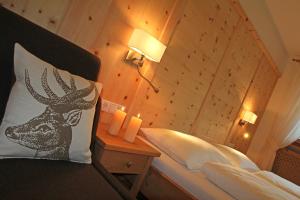 A bed or beds in a room at Ferienwohnung Mair am Bach