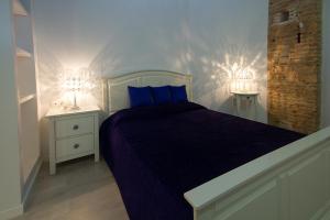 A bed or beds in a room at Total Valencia Elegance