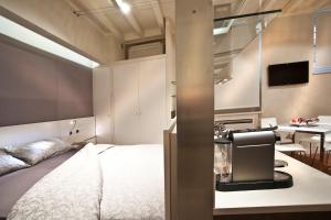 Posteľ alebo postele v izbe v ubytovaní Le Cadreghe Apartments