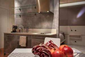 Posteľ alebo postele v izbe v ubytovaní Le Cadreghe Apartments + 23 fotografií