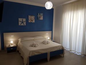 Voodi või voodid majutusasutuse Stella Marina Agropoli toas