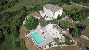 an aerial view of an estate with a swimming pool at Les agaves piscine panoramique vue exceptionnelle in Grospierres