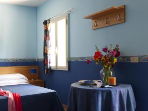 Posteľ alebo postele v izbe v ubytovaní Villaggio Albergo Internazionale La Plaja