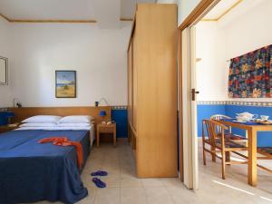 Posteľ alebo postele v izbe v ubytovaní Villaggio Albergo Internazionale La Plaja