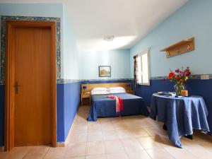 Posteľ alebo postele v izbe v ubytovaní Villaggio Albergo Internazionale La Plaja