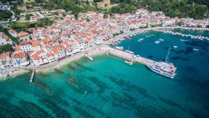 an aerial view of a harbor with boats in the water at Apartment Piccolo in Baška